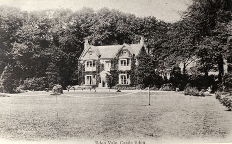 Postcard photograph entitled Eden Vale, Castle Eden showing a large house with four bay windows surrounded by trees and with a tennis lawn in front