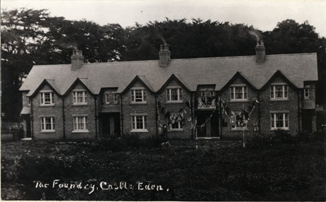 Photograph of the exterior of the front of The Foundry, Castle Eden, showing bunting in place for the celebration of the coronation of Queen Elizabeth II, 1953