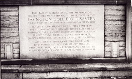 Photograph of a tablet erected in memory of the seventy two men who were killed in the Easington Colliery Disaster on the twenty ninth of May nineteen fifty one, and who were buried in the cemetery; and in memory of nine men buried elsewhere and the two men who were killed in the performance of their duties as rescue workers.