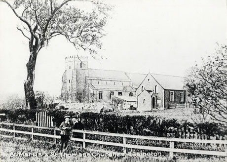Postcard photograph entitled St. Mary's and St. Thomas's Churches, Easington, showing the exterior of the churches taken from the south west; two boys are leaning against a fence which runs across the bottom of the photograph