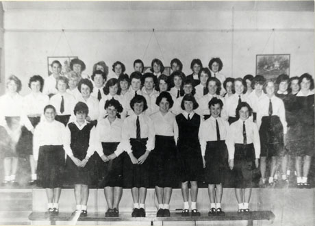 Photograph of forty girls, aged approximately fifteen years, in school uniform, posed inside a building; the photograph has been identified as Senior Girls Horden G. C. E. Stream; the following girls have been identified: second row fourth from the left:Freda Ramshaw; third row fourth from the left; Audrey Crooks; first row first on the left: Gillian Croxford; back row first on the right: Doreen Walton