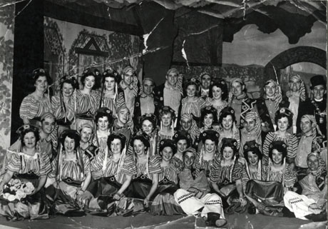 Photograph of thirty six members of the cast of Magyar Melody in costume and grouped on stage; the photograph has been identified as Magyar Melody 1954 Horden and District; the performers are therefore presumably members of the Horden and District Operatic Society