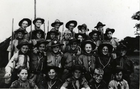 Photograph of a group of twenty five boys in Scout uniform, posed in the open air; the photograph has been identified as portraying the 4th Horden Boy Scouts in 1948