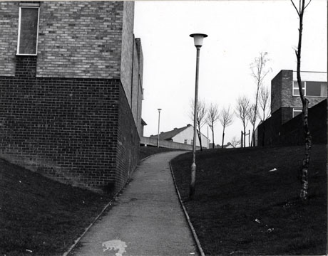 Photograph of the same view as in pete0011, showing a path running to the right and parts of houses, identified as Brandling Court