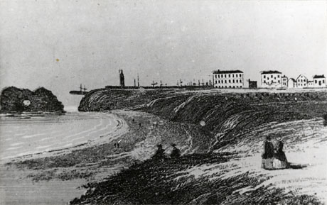 Photograph of an engraving of a bay of the sea, with cliffs to the left, and a rock with a hole in it standing out to the sea;in the distance, is a line of buildings on a headland, beyond which the tops of the masts of sailing ships can be seen; the picture has been identified as Seaham Harbour