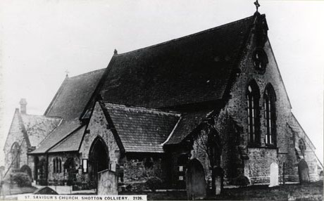 Postcard photograph entitled St. Saviour's Church, Shotton Colliery 2126 showing the exterior of the church from the south west, including the porch and approximately seven gravestones in the church yard