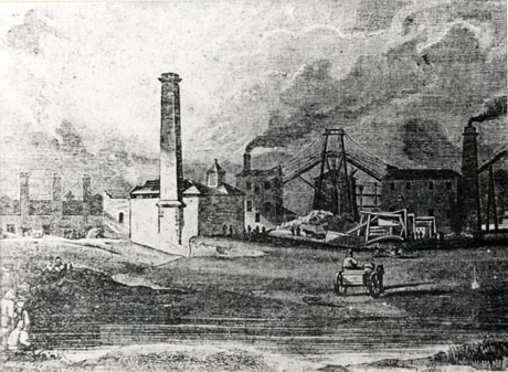 Photograph of an engraving of the buildings of the colliery at South Hetton; the picture shows houses with long chimneys on the left and, next to them, a low building with a high chimney and behind that building a higher one with a lower chimney from which smoke is pouring; in the middle of the picture, the winding gear can be seen and on its right another building and another tall chimney; a cart can be seen in the foreground