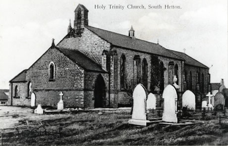 Postcard photograph entitled Holy Trinity Church, South Hetton, showing part of the graveyard, the west end and the side wall and an air vent on the roof